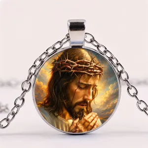 Detailed macro view of sacred Jesus Christ pendant with crown of thorns and glass dome