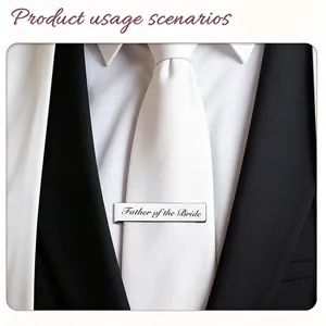 Silver stainless steel tie clip engraved with Father of the Bride shown on a white tie