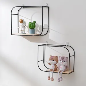 Minimalist black metal wall-mounted shelves with wooden base for stylish home wall decor