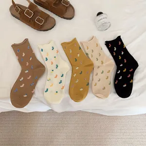 Japanese style cute patterned roll-cuff mid-calf cotton socks for women, trendy daily wear.