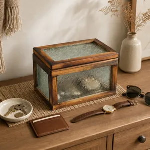 Vintage walnut wood storage box with begonia patterned glass on a wooden dresser