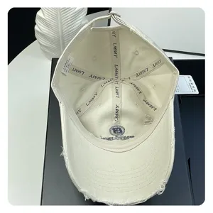 Distressed white baseball cap for women, vintage soft top curved brim hat, casual streetwear.