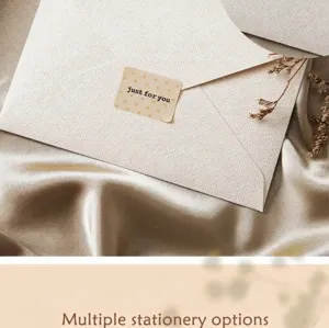 Elegant stationery envelope set with textured paper and silk background for greeting cards.
