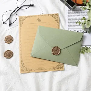 Avocado green envelope and kraft letter paper set with wax seals, vintage stationery kit for letters.