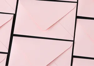 Pink envelope detail view, elegant romantic paper stationery for love letters and notes.