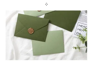Avocado green envelope and letter paper set with vintage wax seal for cards and invites.