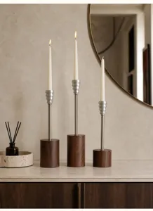 Elegant set of three Nordic wood and aluminum candle holders for dining table decor
