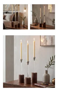 Detailed view of luxury Nordic candle holders with wooden bases and bubble glass stems