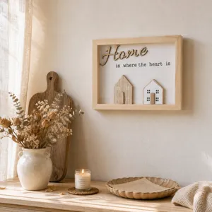 European style wooden wall art frame with 'Home is where the heart is' quote