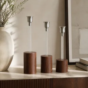 Set of 3 elegant Nordic style aluminum and wood candle holders for modern table decoration