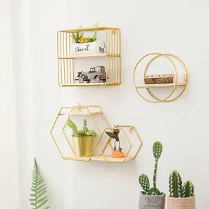 Modern gold iron wall-mounted floating shelves with wooden base for stylish home decor