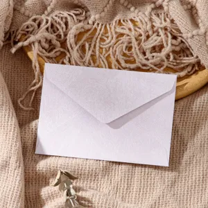 Pink retro style envelope detail shot, elegant textured paper stationery for letters.