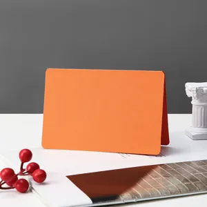 Minimalist orange folded greeting card blank note card for DIY hand-painted writing message.