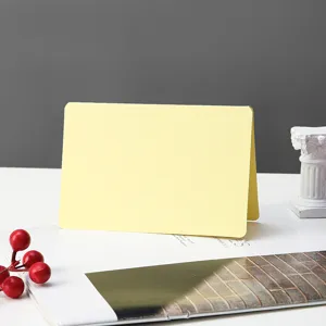 Blank folded greeting card detail shot, perfect for DIY hand painting, graffiti and custom notes.