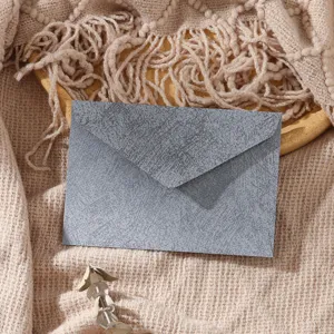 Detailed view of minimalist retro grey textured envelope, perfect for handwritten letters and cards.