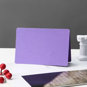 Purple blank folded greeting card detail shot, perfect for DIY hand-painting and notes.