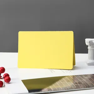 Yellow blank folding card for handmade graffiti, word card, and minimalist gift card.