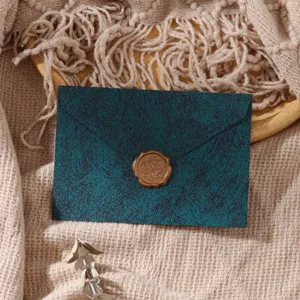 Retro dark green envelope set with wax seal stamp, elegant western style stationery for letters.