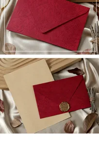 Vintage textured red envelope and lined stationery paper detail view with elegant wax seal.