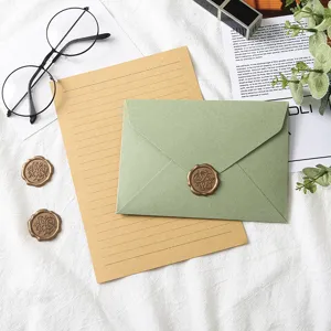 Avocado green envelope and letter paper set with vintage wax seals for greeting cards and letters.