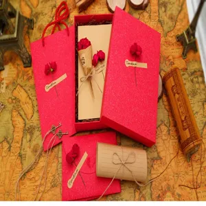 Detailed view of the vintage stationery gift box set, featuring red envelopes and romantic letters.