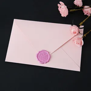 Pink paper envelope with purple wax seal romantic stationery for love letters and gifts