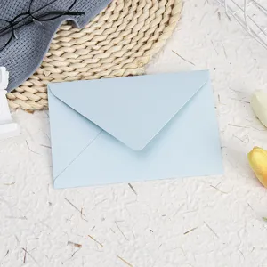 Detailed view of the elegant light blue pearlescent envelope, perfect for letters and cards.