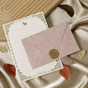 Vintage stationery set with letter paper, textured envelope and wax seal for romantic letters.