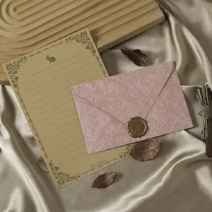 Vintage stationery writing paper and envelope set detail shot with retro aesthetic design.