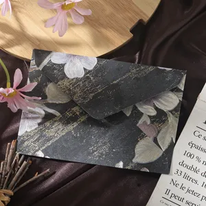 Vintage floral textured envelope with exquisite gold stamping design for elegant letters.