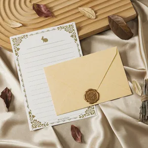 Detailed close-up of retro stationery set featuring vintage envelope and wax seal.