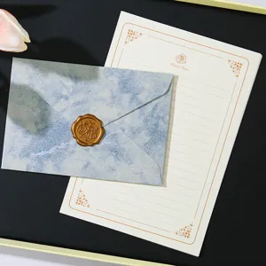 Set di carta da lettere e busta vintage con marmo blu e sigillo in cera dorato fine.