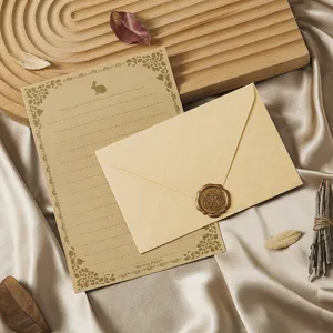Vintage kraft paper stationery set with envelope, letter paper and wax seal for romantic letter writing.