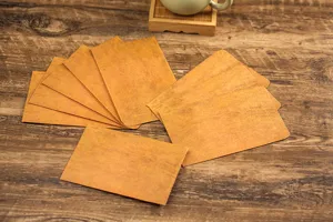 Detailed display of vintage kraft paper envelopes and stationery for retro handwritten letters.