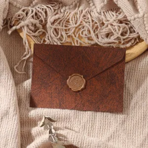 Vintage brown wax seal envelope detail shot, elegant stationery for romantic handwritten letters.