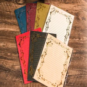 Vintage gold foil letter paper set, elegant floral stationery for romantic letters and invitations.