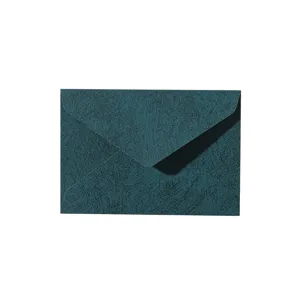 Dark green textured envelope detail, retro tree grain stationery paper, minimalist wedding letter cover.