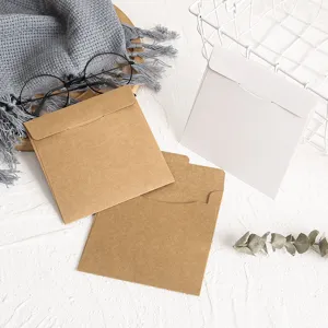 Pochettes de rangement CD DVD papier kraft et blanc disques vue de detail setup photo