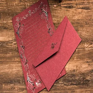 Vintage red stationery letter paper and envelope set with embossed floral patterns for love letters.