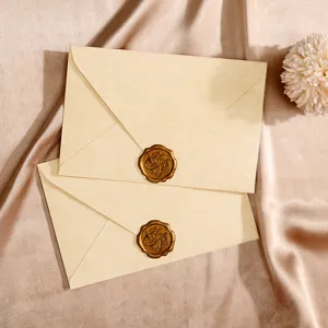 Vintage style thick paper envelopes with wax seal stamp detail shot for romantic letters.