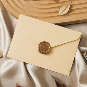 Vintage craft paper envelope with wax seal, elegant retro stationery for letters and cards.