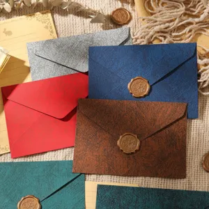 Vintage colored paper envelopes set with wax seal stamps, retro stationery for letters.