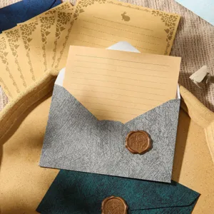 Vintage stationery set with tree grain envelopes, lined letter paper and wax seal stamps.