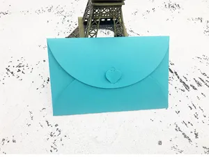 Teal paper envelope with heart buckle, creative letter set for greeting cards, notes and letters.