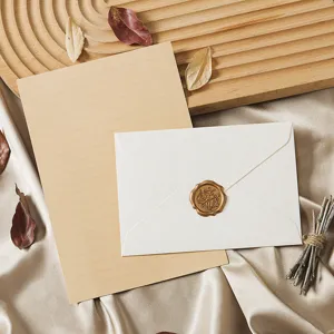 Vintage stationery set with letter paper, envelope and wax seal for retro letters and notes.