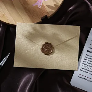 Vintage burlap texture envelope with wax seal, elegant stationery for letters and cards.