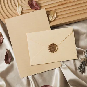 Vintage kraft stationery set with lined letter paper, envelope and decorative wax seal.