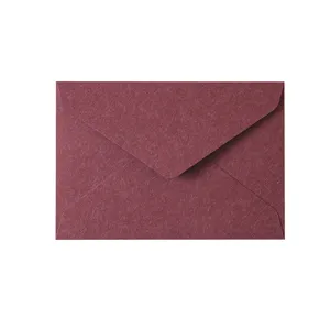 Vintage dark red textured paper envelope for greeting cards, invitations, and stationery items.