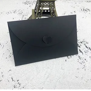 Black paper envelope with heart buckle closure for love letters, greeting cards and stationery.