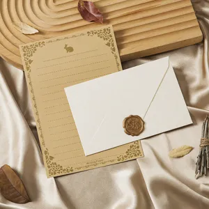 Retro stationery set with letter paper, envelope, and wax seal, vintage romantic design style.
